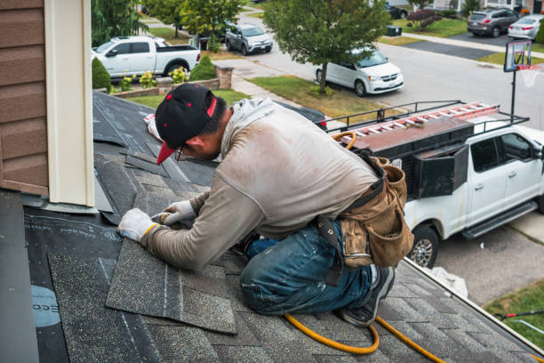 Professional Roofing technician working in Madison, IN